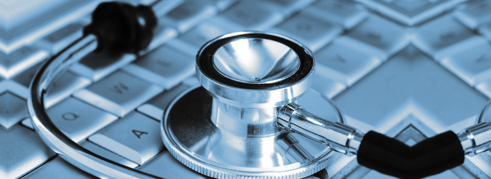 medical laptop and stethoscope